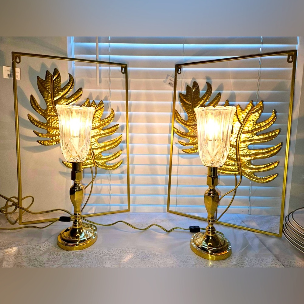 Beautiful custom brass candlestick lamps with
fluted and cut crystal globes.